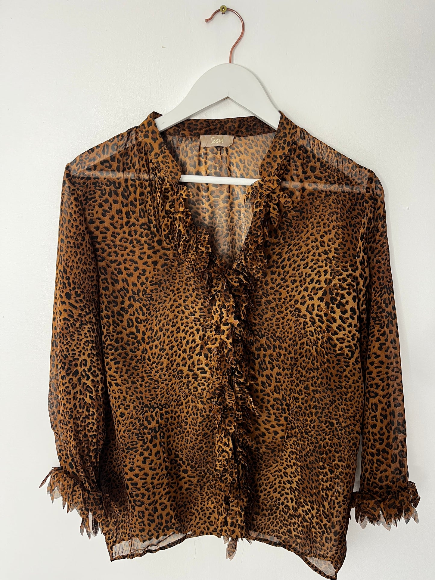 Semi Sheer Animal Print Ruffle Blouse